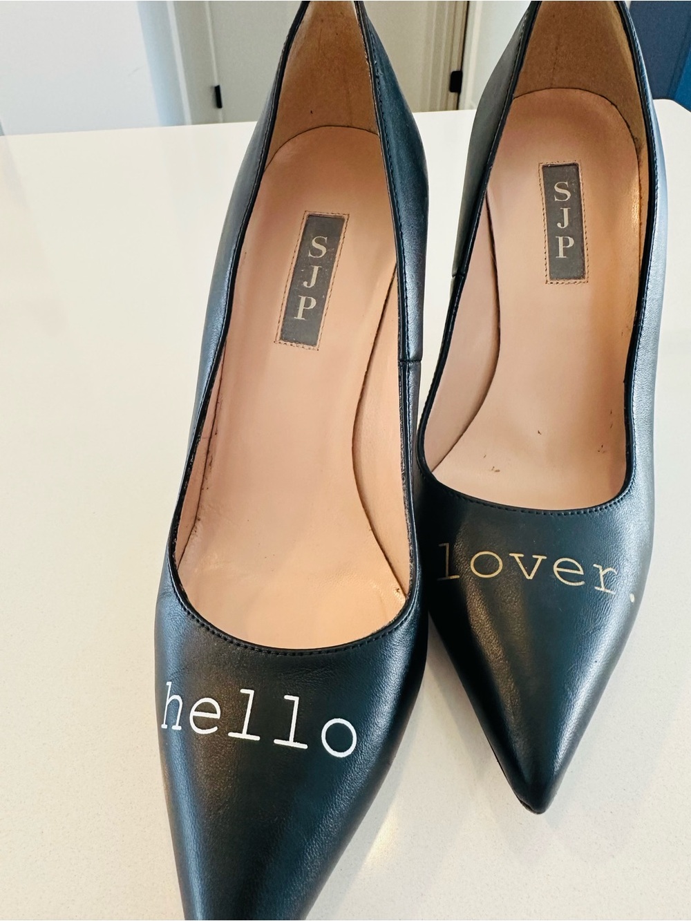 SJP by Sarah Jessica Parker Black Pointed Leather Fawn Pump “Hello Lover”